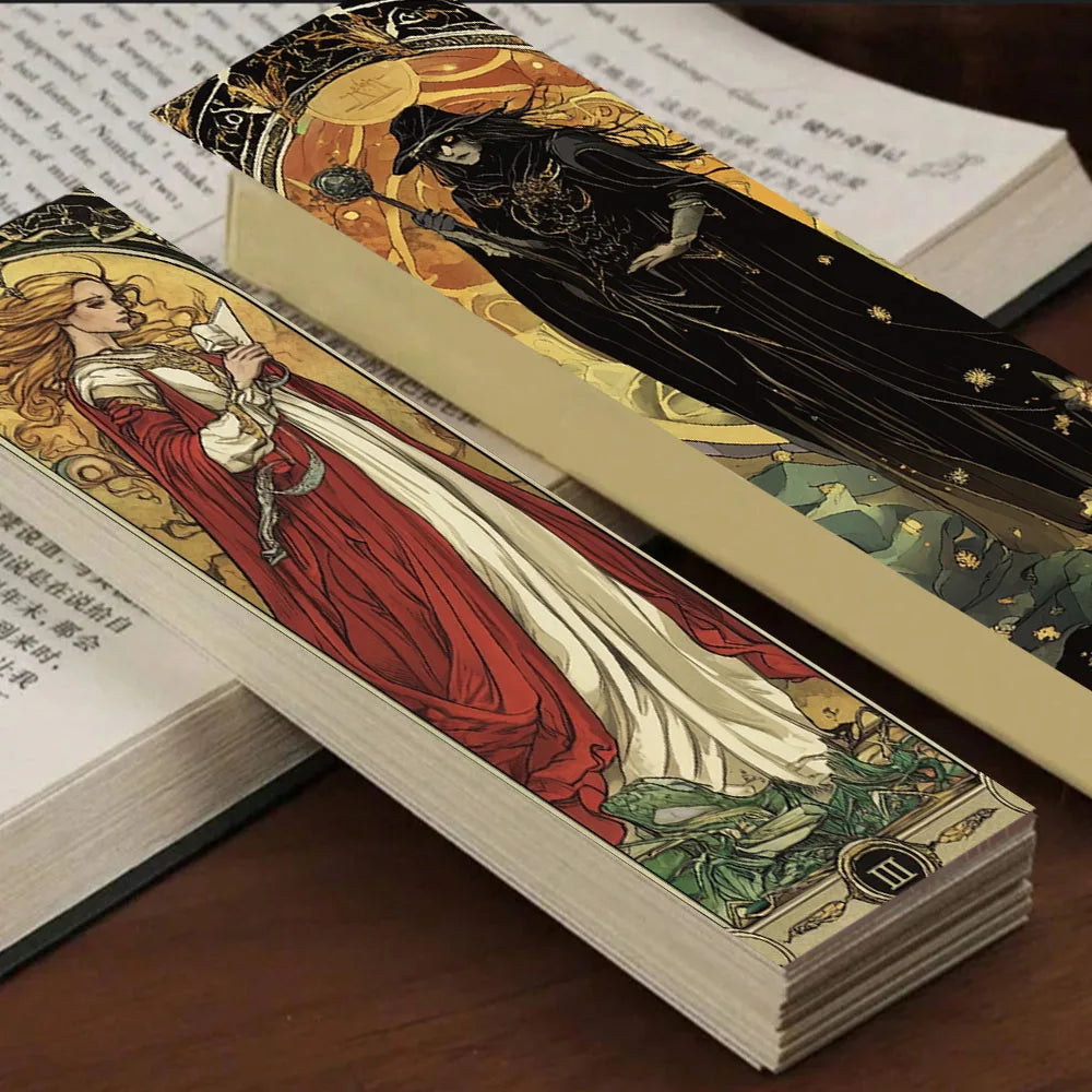 Art Nouveau-style bookmarks with intricate designs on an open book.