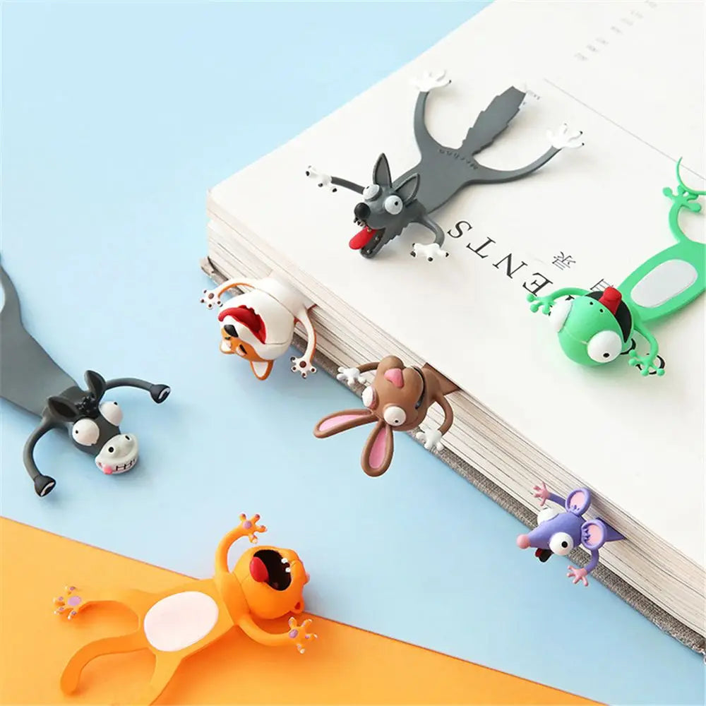 Set of cartoon animal-shaped bookmarks on a notebook with a blue and orange background.