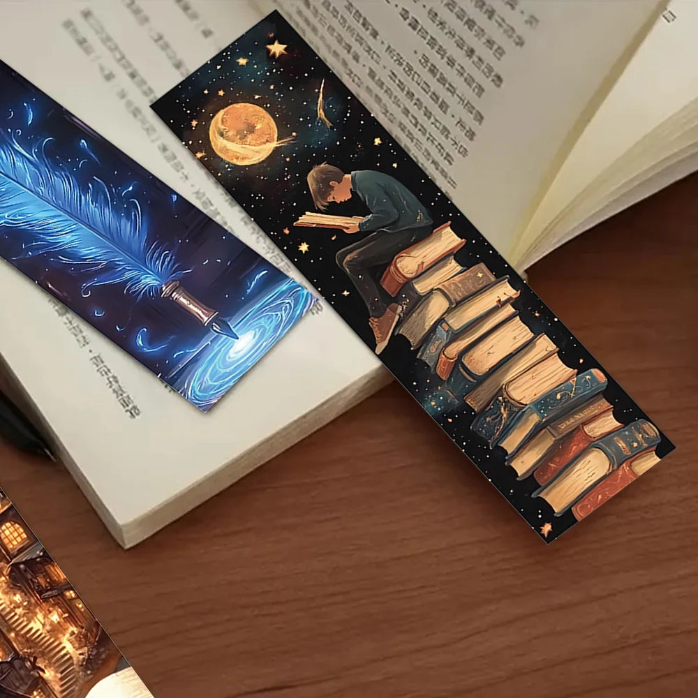 Decorative bookmark with a design of a person reading on a stack of books, placed on an open book.