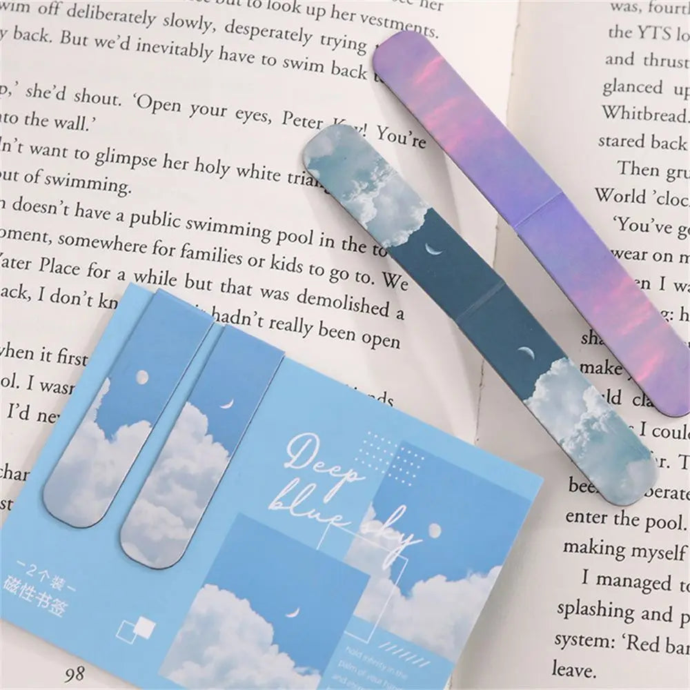Set of bookmarks with cloud design on a book page