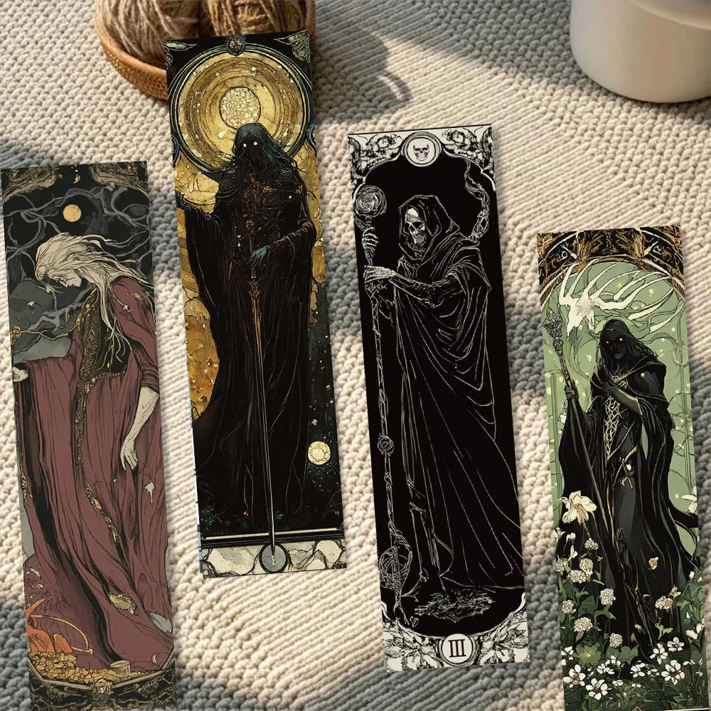 Set of tarot cards with dark, mystical designs on a textured surface.