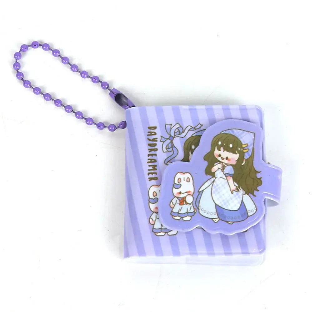 Small purple pouch with cartoon design on a white background