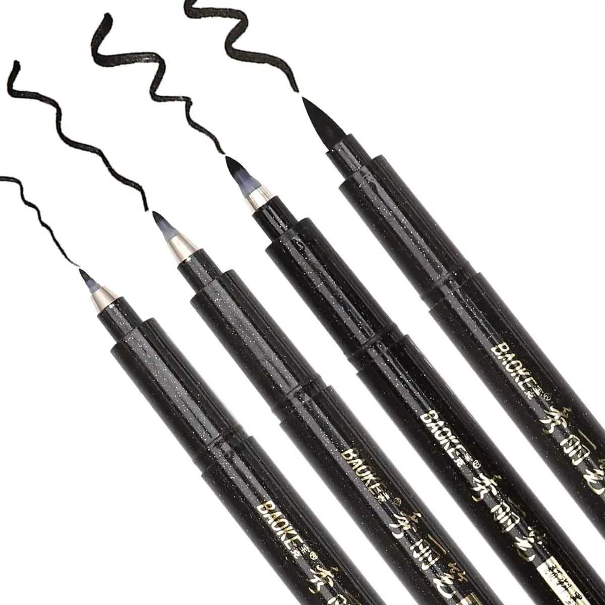 Set of black eyeliner pencils with wavy lines on a white background