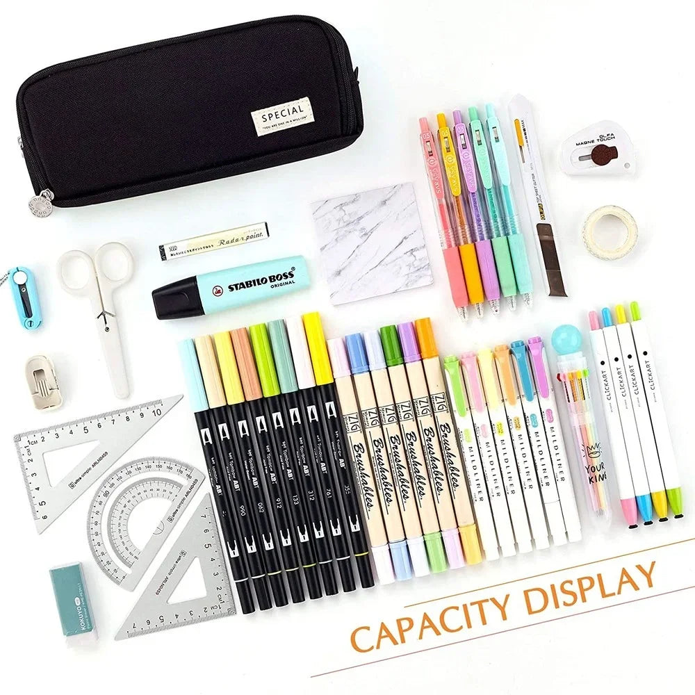 Assorted stationery items including pens, markers, and a black pencil case on a white background.
