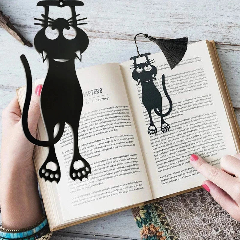 Cat Bookmarker in a Book on a table