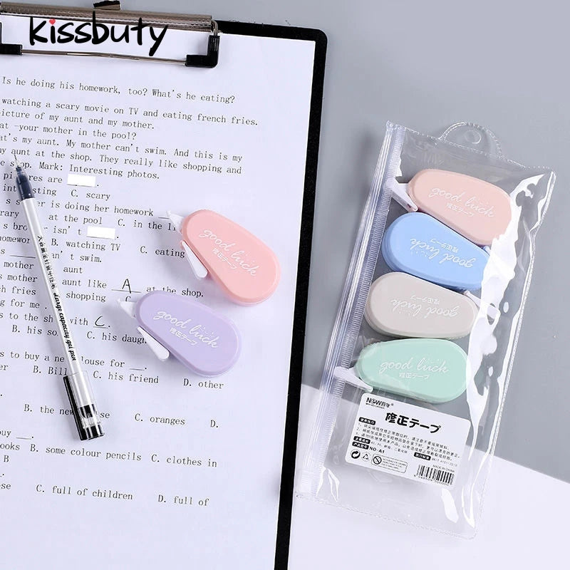 Set of colorful correction tapes on a piece of paper with 'Kissbuty' branding.