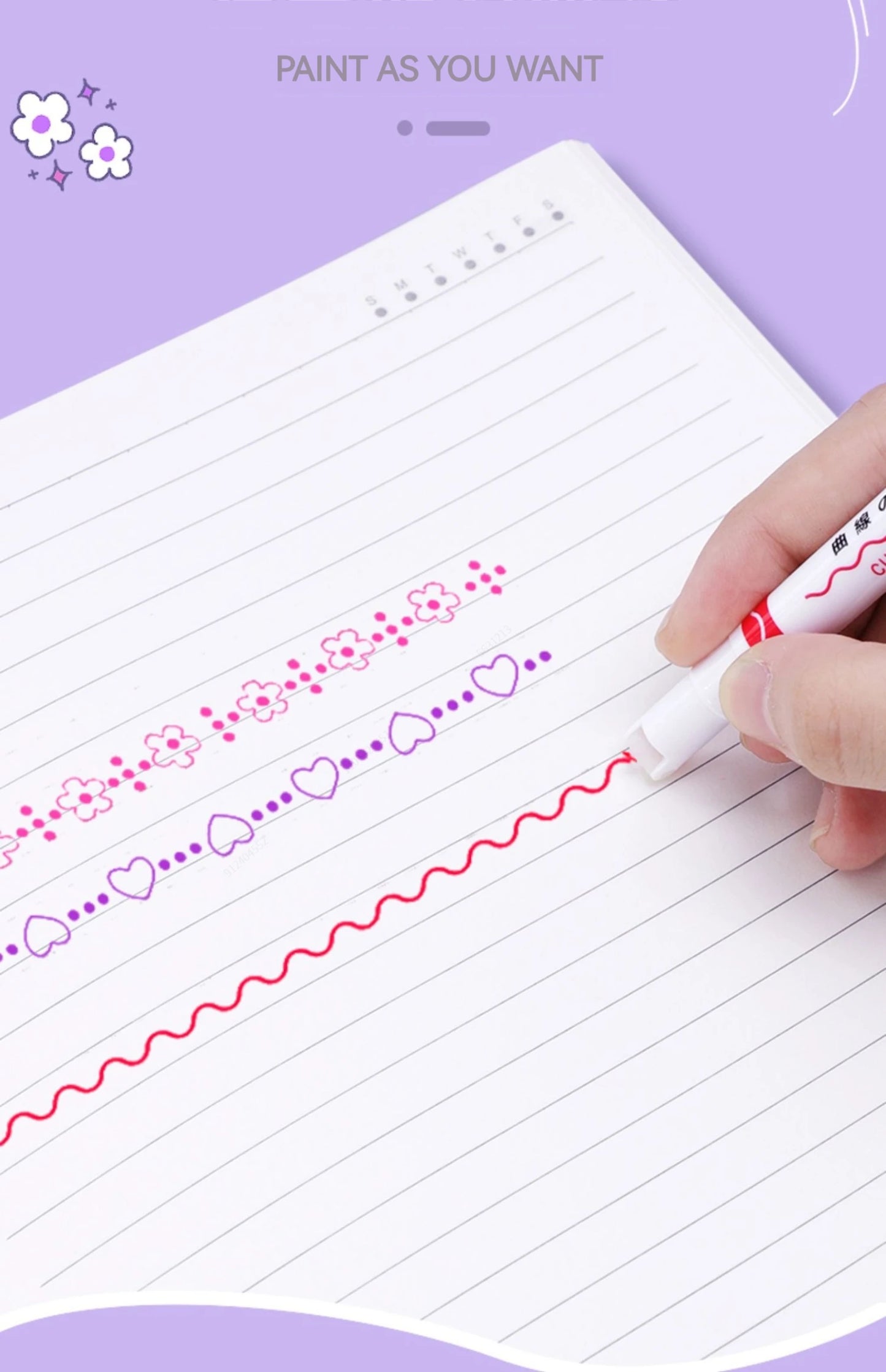 Hand holding a marker with decorative lines on lined paper against a purple background