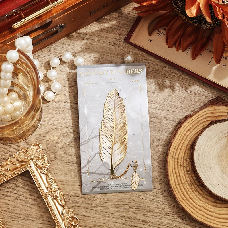 Product packaging with feather design on a wooden surface with decorative items.