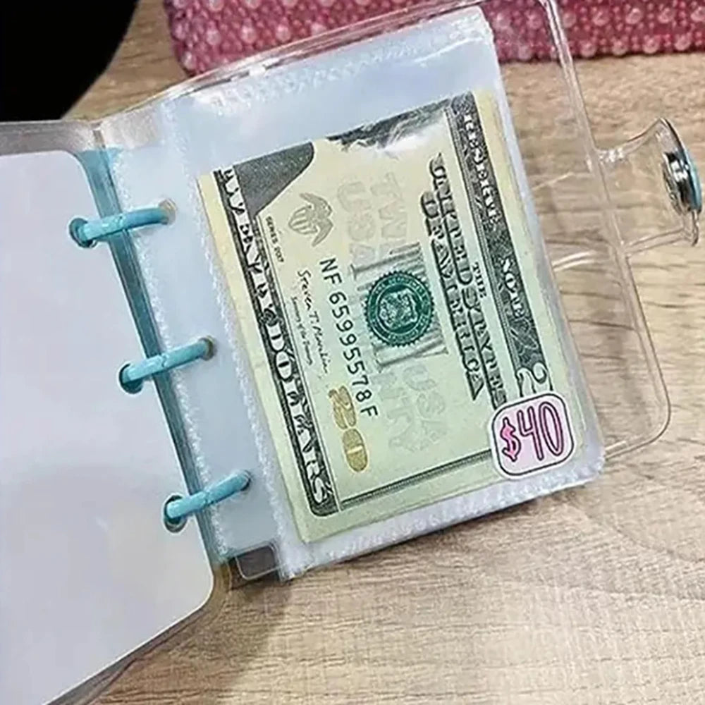 Two hundred-dollar bill in a clear plastic holder with a price tag of $40 on a wooden surface.