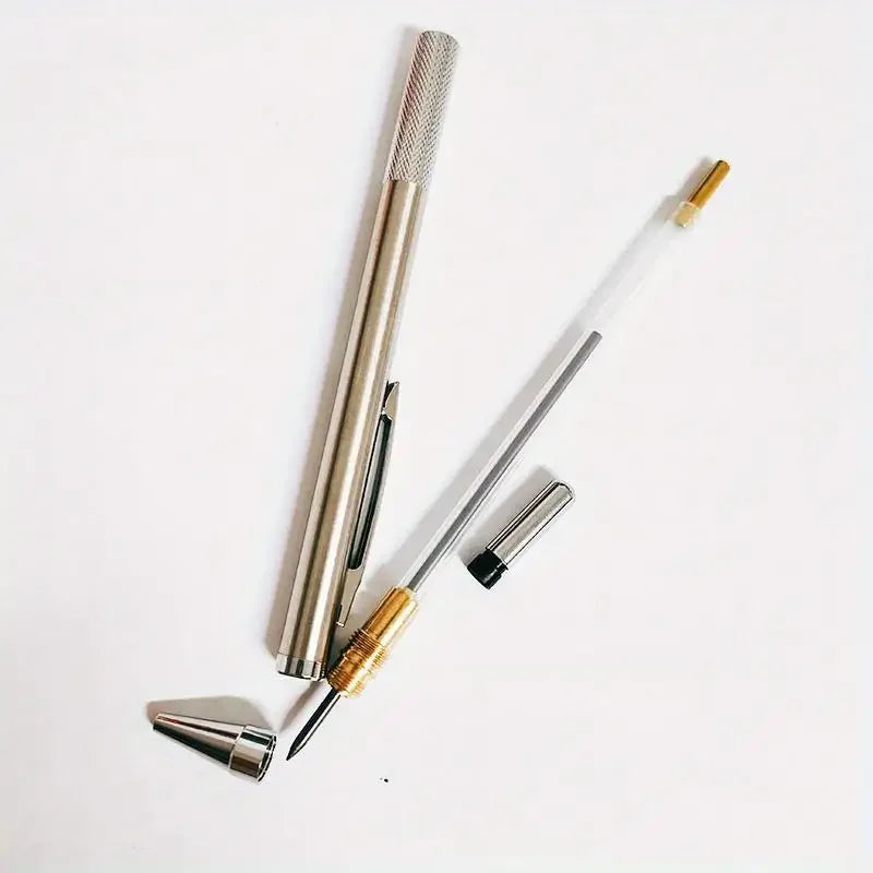 Metallic pen with interchangeable components on a white background