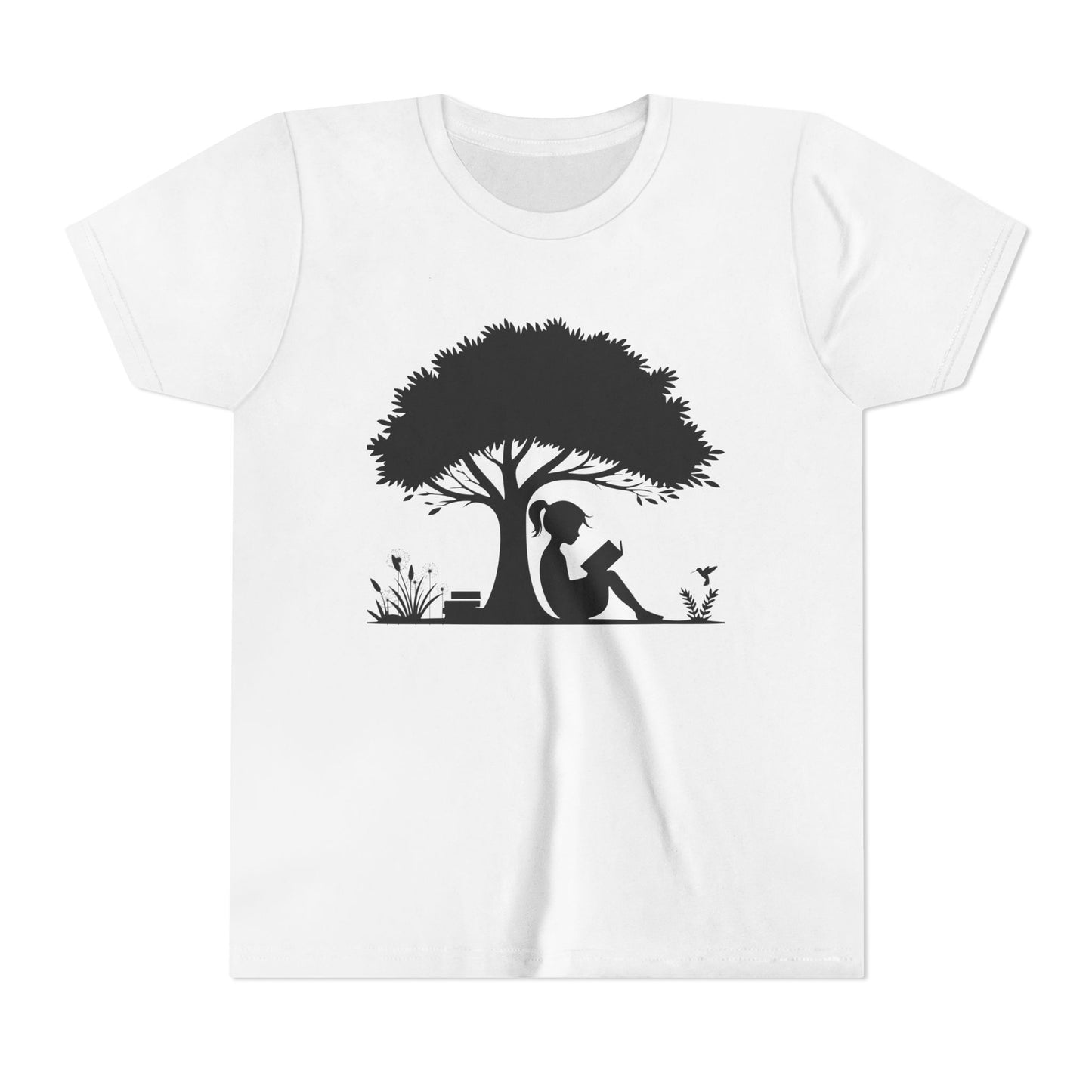 White t-shirt with a black silhouette of a girl under a tree and reading a book.