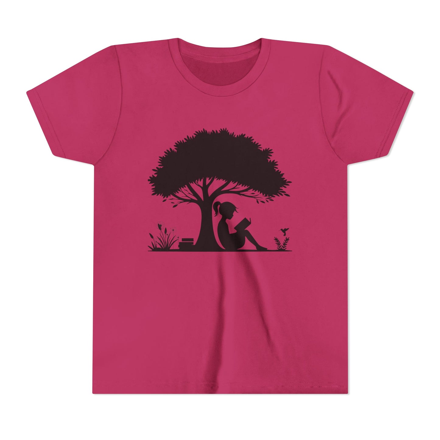 Pink t-shirt with a black silhouette of a girl under a tree on a white background