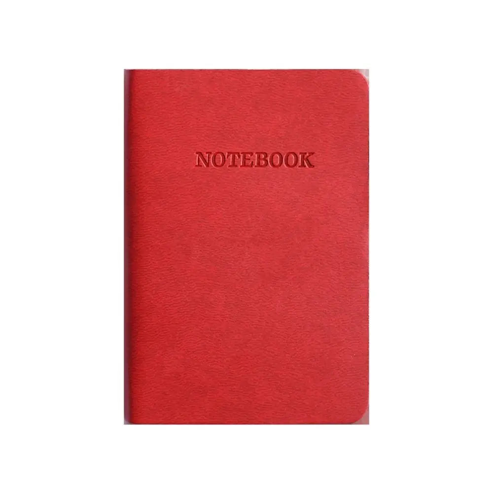 Red notebook with 'NOTEBOOK' text on a white background
