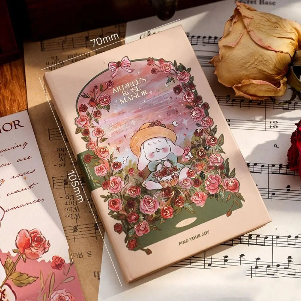Notebook with floral design and character illustration on a sheet of music
