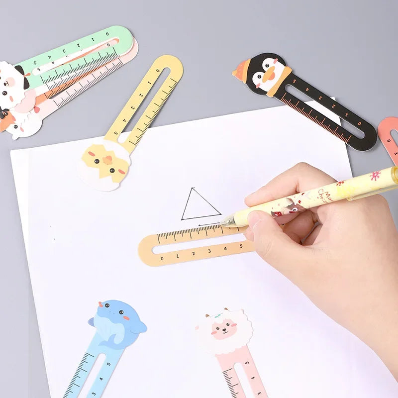 Ruler Bookmarker below a triangle on paper