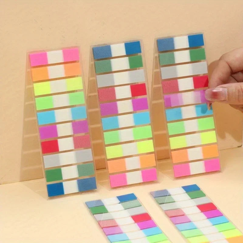 Colorful square sticky notes on a beige background