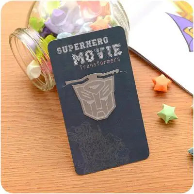 Transformers Bookmark leaning on a jar