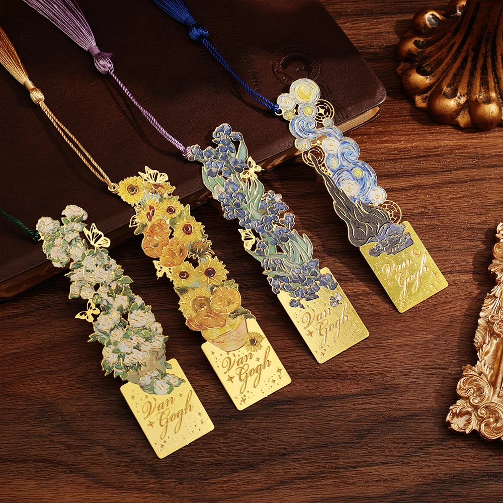 Decorative bookmarks with floral designs and 'Van Gogh' text on a wooden surface.