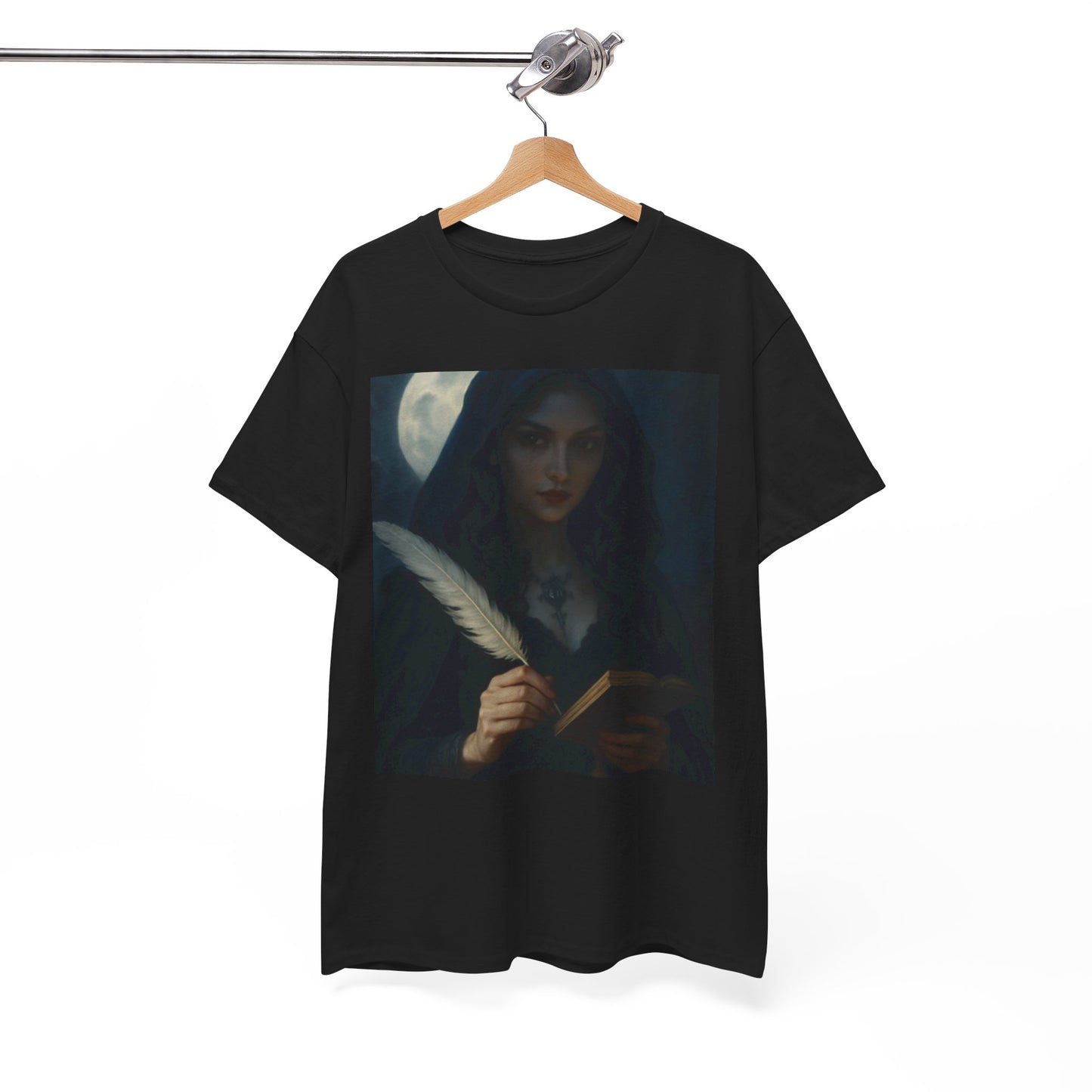 Black t-shirt with a graphic design of a person holding a feather and book, hanging on a wooden hanger against a white background.