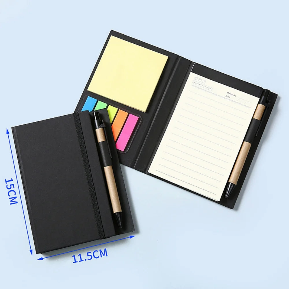 Black notebook with pen, sticky notes, and colorful markers on a light blue background