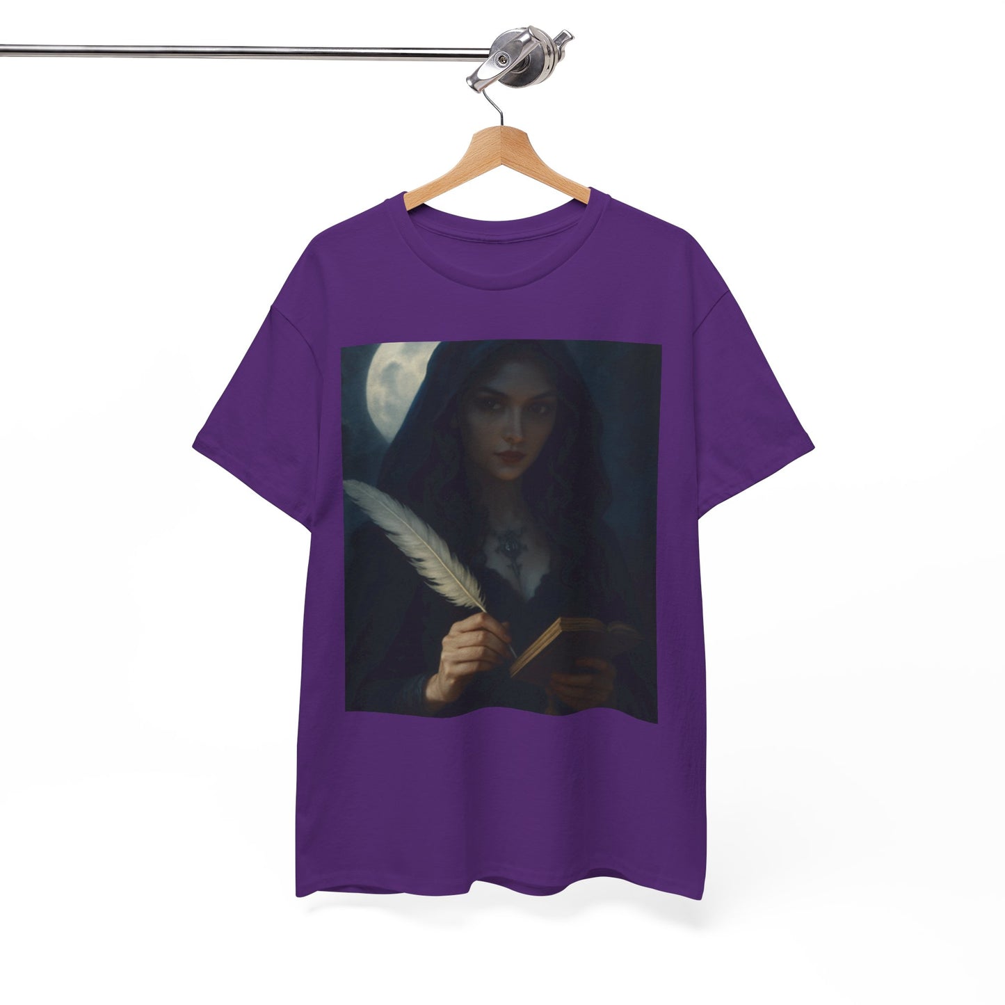 Purple t-shirt with a graphic of a woman holding a feather pen and book, hanging on a wooden hanger against a white background.