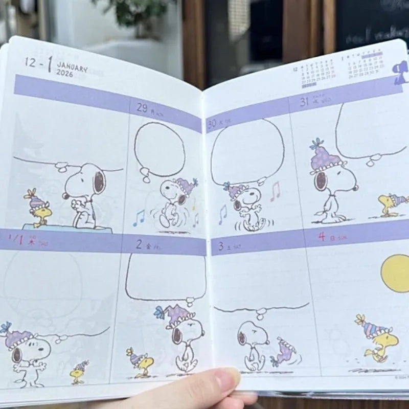Calendar with cartoon characters on a blurred indoor background
