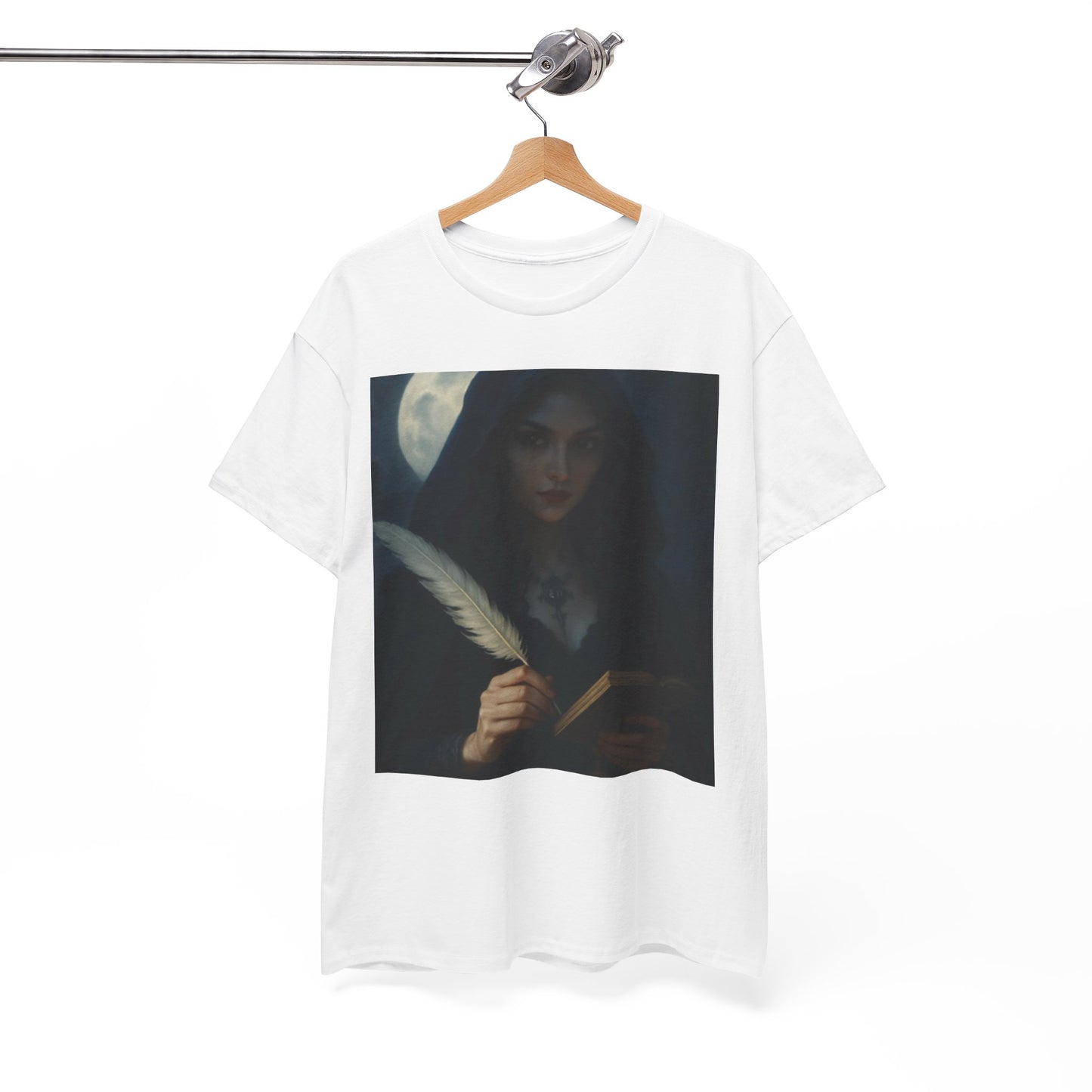 White t-shirt with a graphic design of a woman holding a feather and a book, hanging on a wooden hanger against a white background.