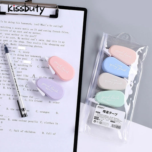 Set of colorful correction tapes on a piece of paper with 'Kissbuty' branding.