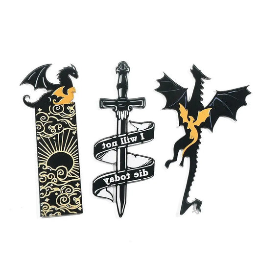 Decorative items with dragons and a sword on a white background