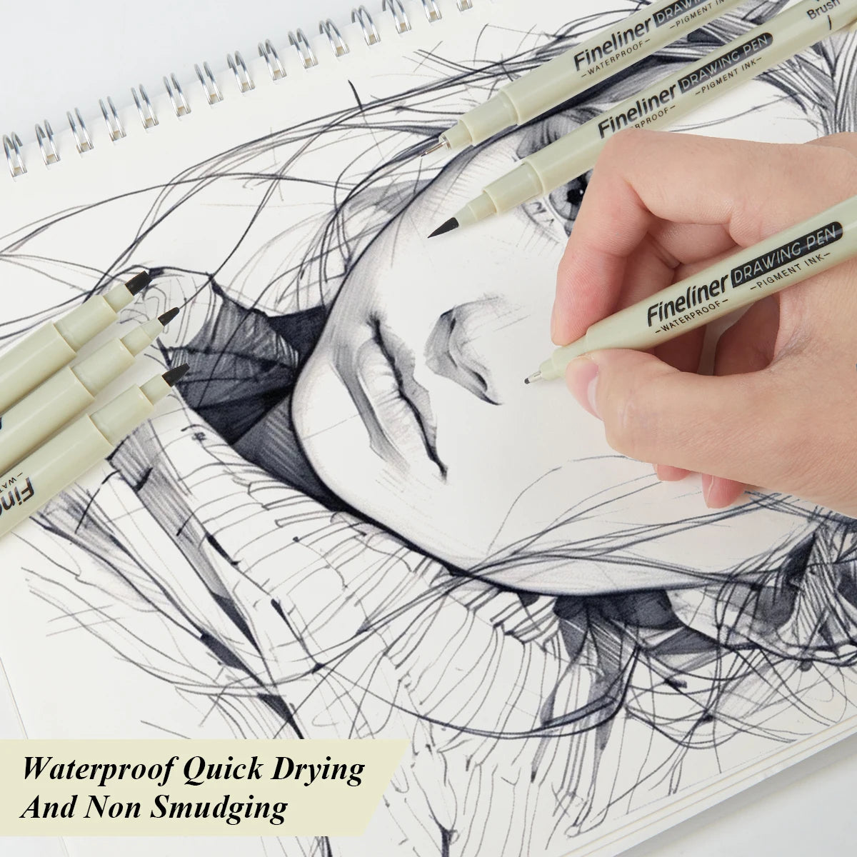 Hand holding a fineliner pen over a drawing with text 'Waterproof, Quick Drying, And Non Smudging'.