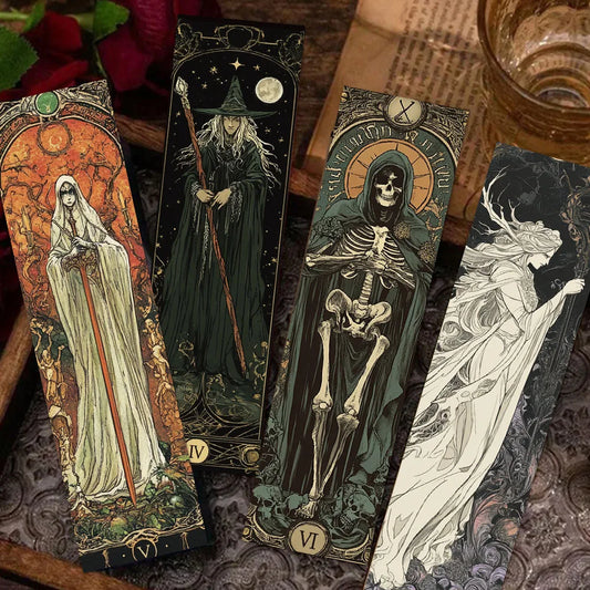 Set of tarot cards with gothic and mystical designs on a textured surface.