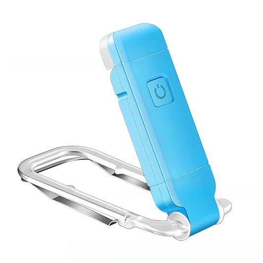 Blue handheld device with a carabiner on a white background