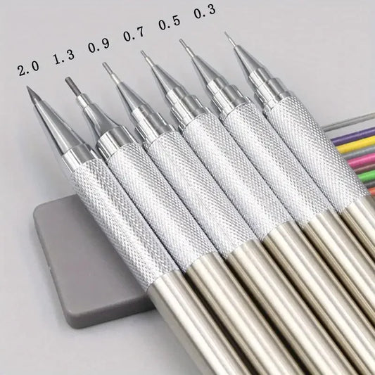 Set of metal tools with varying sizes on a gray background
