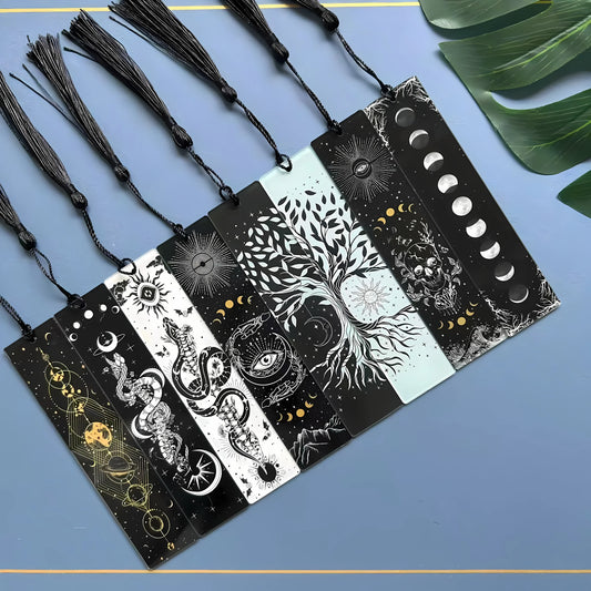 Set of black bookmarks with white designs on a blue background