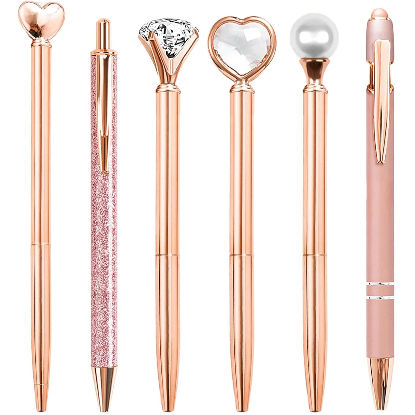 Set of rose gold pens with decorative tips on a white background