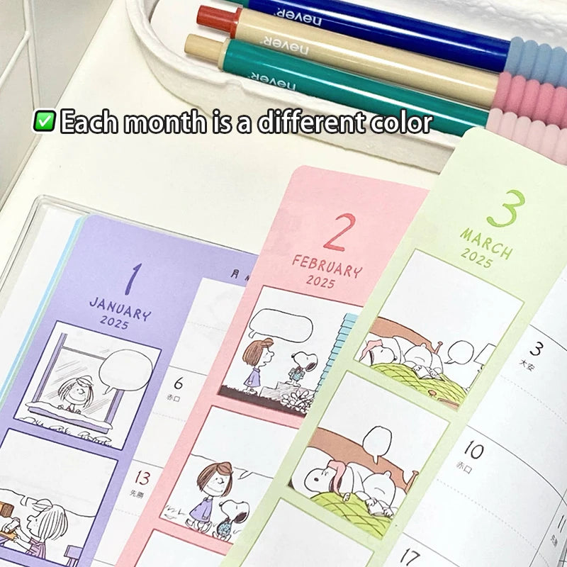 Small calendar sticky notes with different colors for each month, displayed with pens.