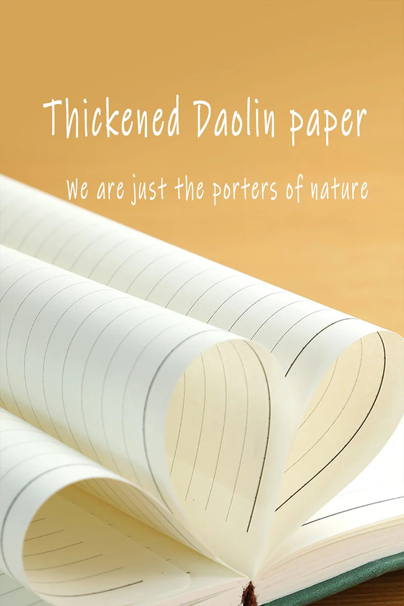 Open notebook with lined pages on a beige background with text 'Thickened Daolin paper We are just the porters of nature'.